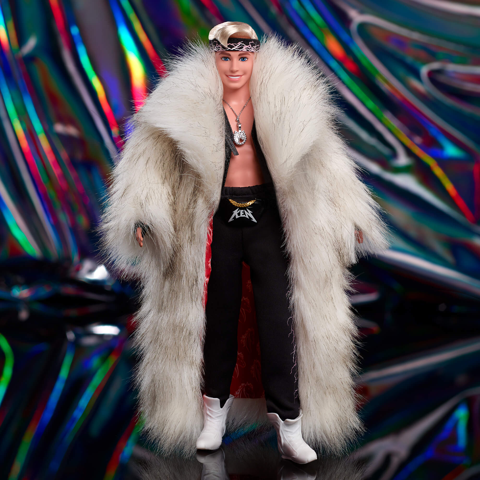 Ken Doll in Faux Fur Coat and Black Fringe Vest ?C Barbie The Movie